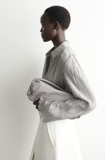 Mini Cylindrical Textured Leather Clutch Bag - Image 3